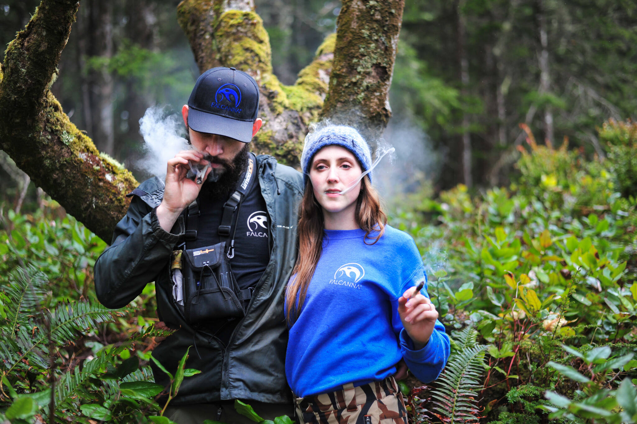 Justin and Bethany Rondeaux, falconers and cannabis growers, smoke together. (Photo provided)