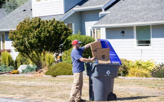 Photo provided
An Island Disposal customer fills a recycling container.