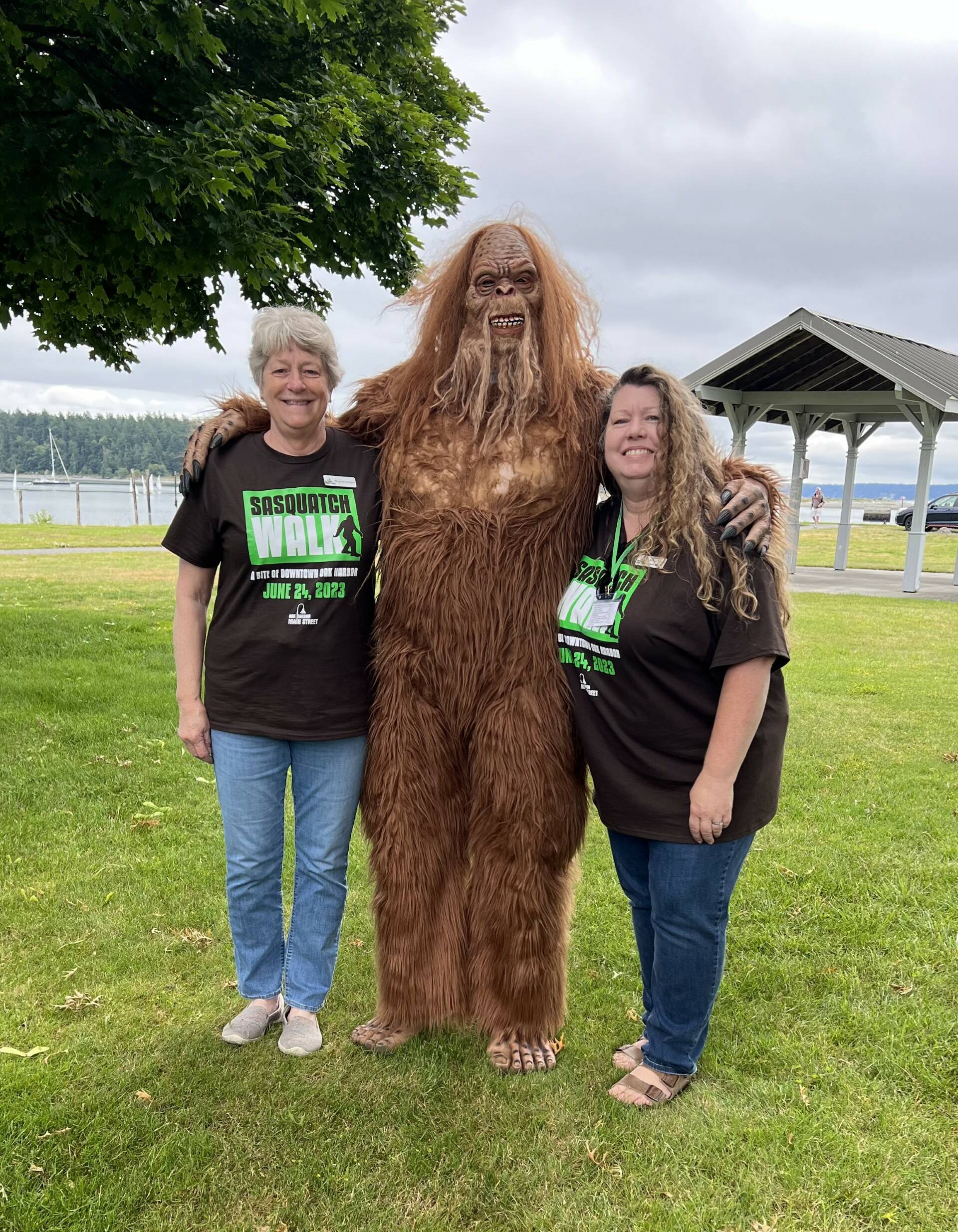 (Photo provided)
Margaret Livermore, at left, and Teresa Bisaw hang out with Garry the Sasquatch during the Sasquatch Walk, an annual fundraiser launched by the Oak Harbor Main Street Association to fund various projects.