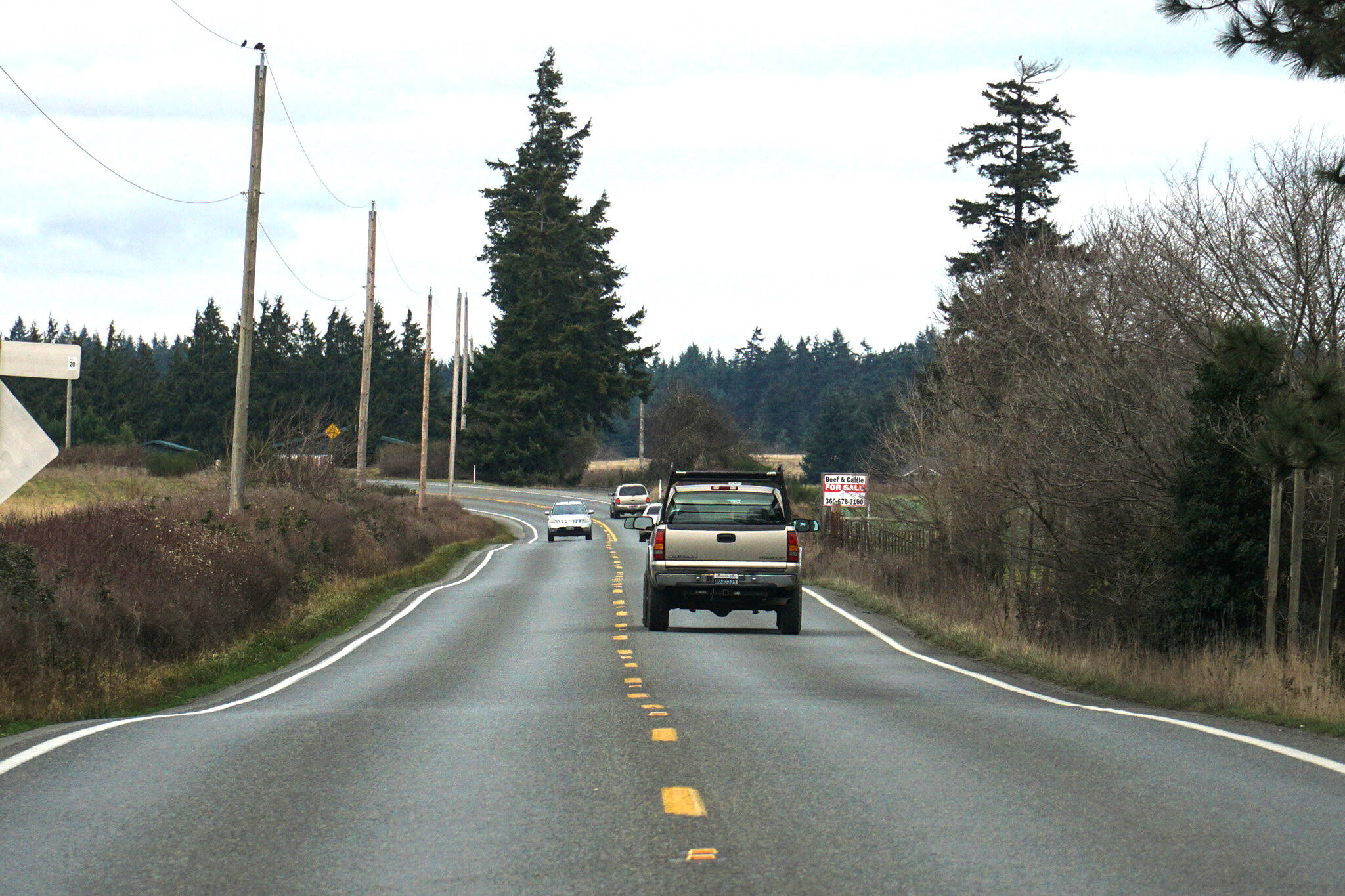 (Photo by Sam Fletcher)
Cars pass through the narrow stretch between Race and Welcher roads, a stretch that the Department of Transportation has talked about widening for years.