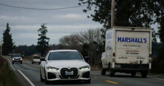 Cars pass through the narrow stretch between Race and Welcher roads, a stretch that the Department of Transportation has talked about widening for years. (Photo by Sam Fletcher)