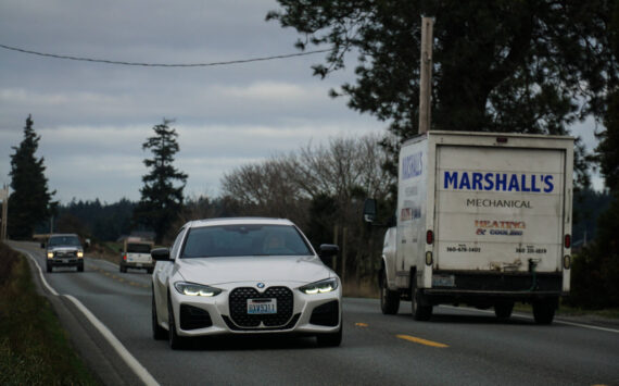 Cars pass through the narrow stretch between Race and Welcher roads, a stretch that the Department of Transportation has talked about widening for years. (Photo by Sam Fletcher)