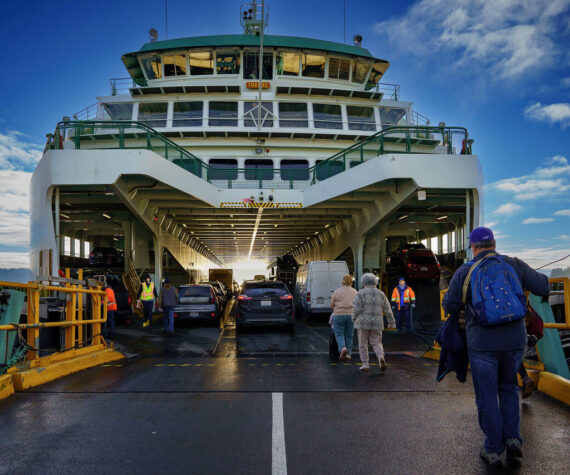 <p>Photo by David Welton</p>
                                <p>Passengers walk onto the Tokitae ferry in Clinton.</p>