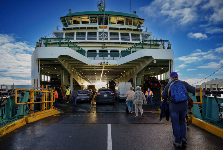 <p>Photo by David Welton</p>
                                <p>Passengers walk onto the Tokitae ferry in Clinton.</p>