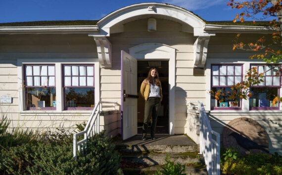 File photo by David Welton
Library Manager Kaley Costello stands in front of the original part of the Langley Library in 2023.