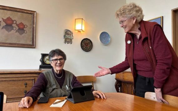 Spouses Diane Divelbess and Grethe Cammermeyer share a light moment in their home. Photo by Kate Poss